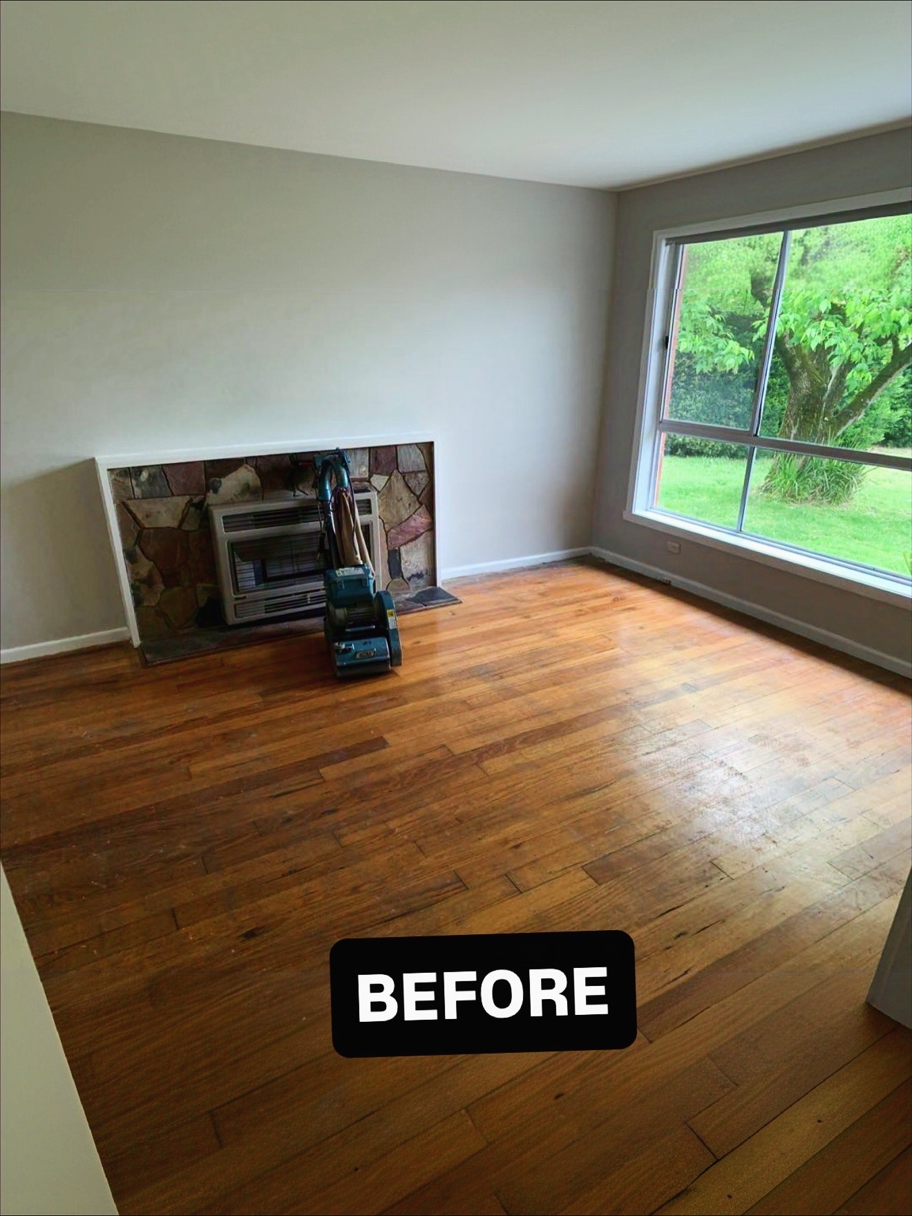 Living room floor before sanding